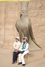tourists with Horus statue