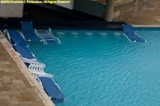 deck chairs in the pool