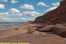 red beach and cliff