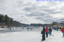 planes lined up to take off on the ice