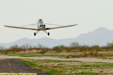 tow plane landing, dragging rope