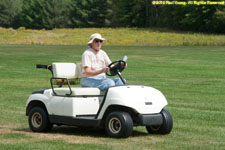 Charlotte driving gold cart